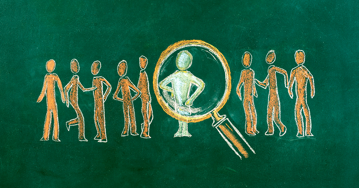 Featured Image for article: magnifying class examining crowd for tribal knowledge