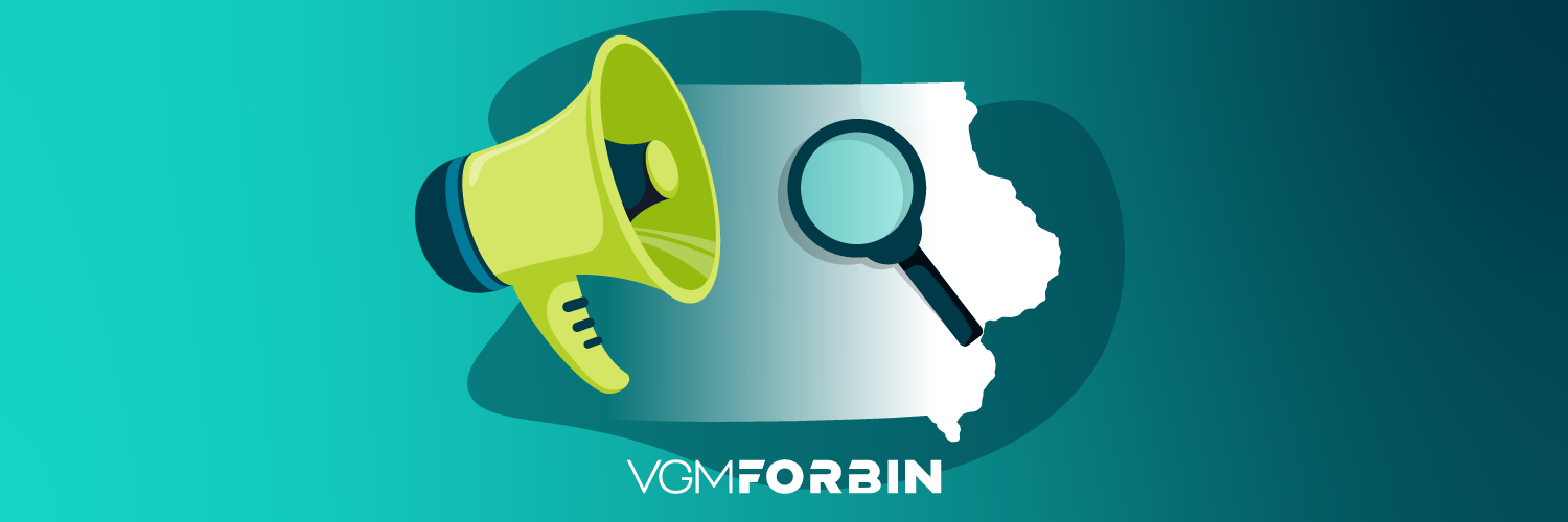 Megaphone and magnifying glass over Iowa map representing local SEO strategy.
