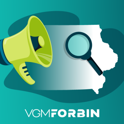 Megaphone and magnifying glass over Iowa map representing local SEO strategy.
