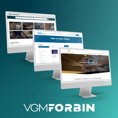 website examples on three monitors