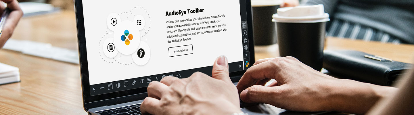person in office setting looking at Audioeye toolbar for accessibility